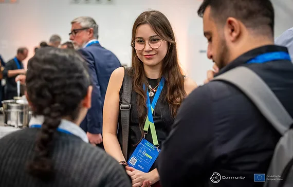 People talking at an EIT Community event